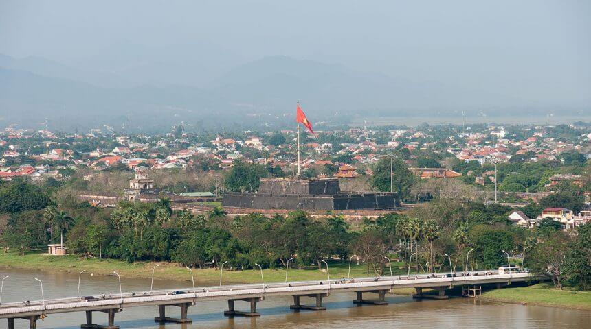 The Perfume River (Hương Giang) and the Phú Xuân Bridge at Huế, where author Andrew Lam lived as a child.
