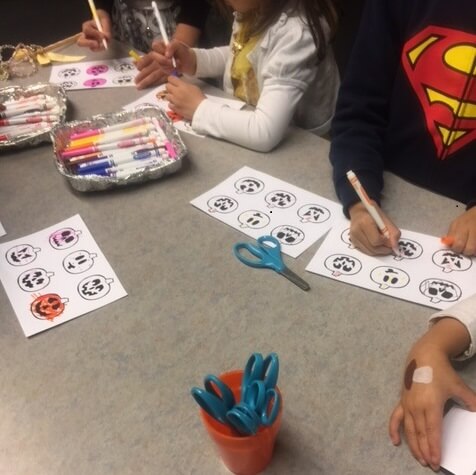 Children decorating a take-home memory game