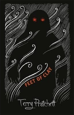 Alternative Cover Art of Feet of Clay featuring a dark Golem figure with glowing red eyes