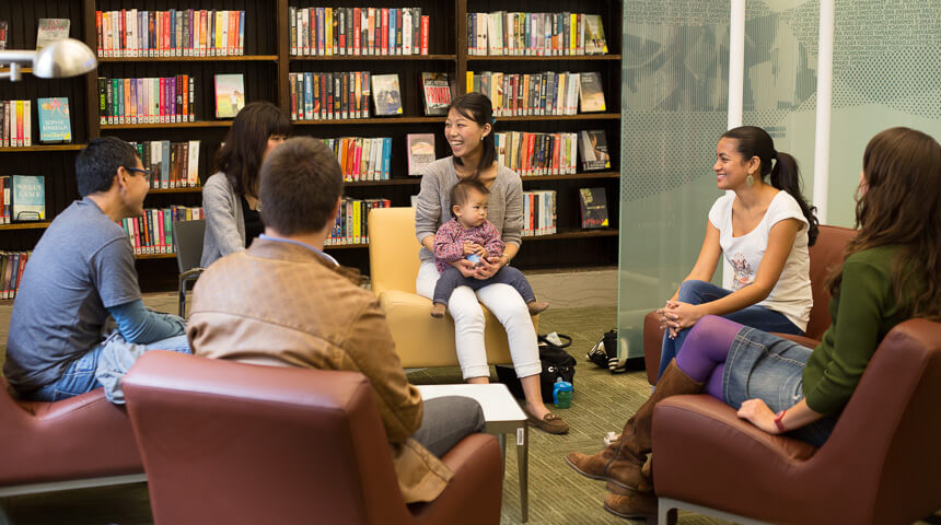 People sitting in a circle in the library