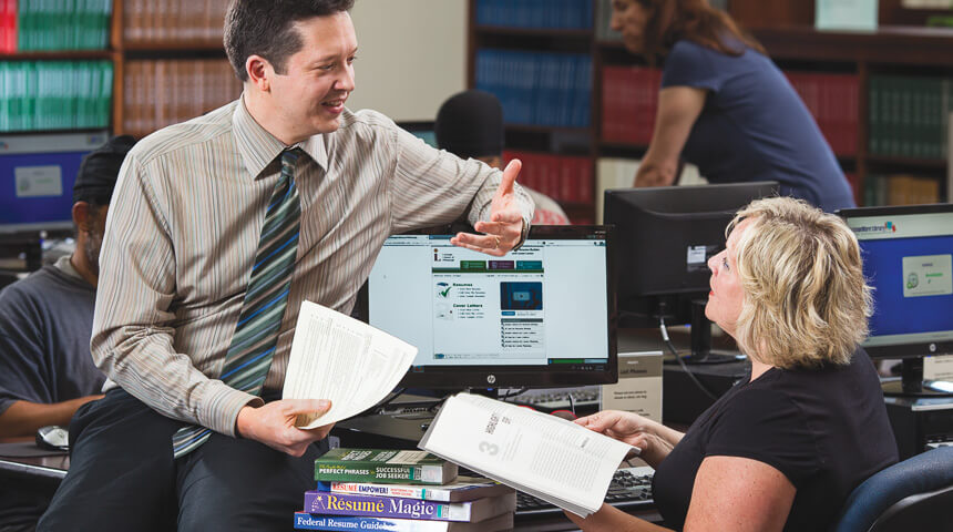 Man and woman discussing philanthropy resources