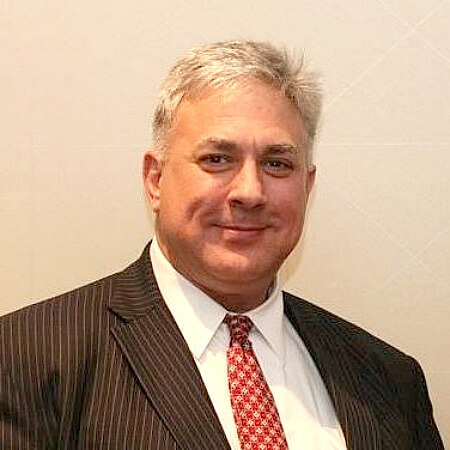 Portrait photo of board member DeMarco