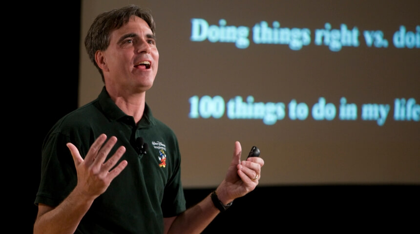 Randy Pausch giving a talk in front of presentation screen