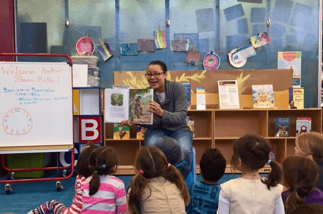Local author, Shana Keller reads her book to a group of children.