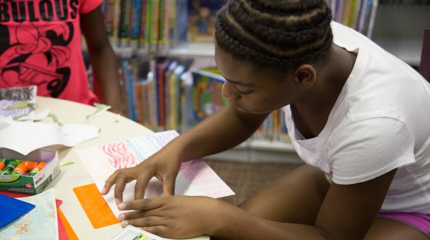 Teen working on an art project