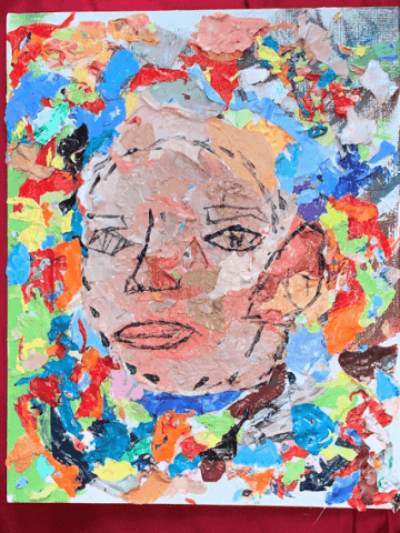 Decoupage art depicting a human face with a multicolored background