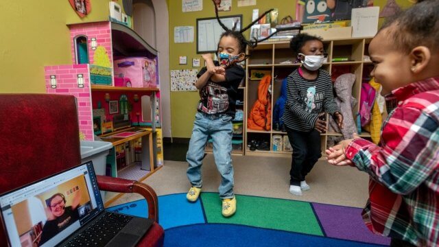 Children dancing during a CLP virtual storytime.