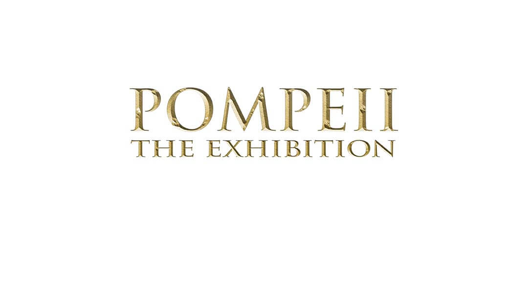Carnegie Science Center exhibition name - "Pompeii: The Exhibition" in gold letting