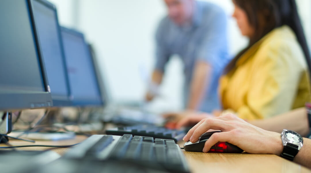 People using library computers