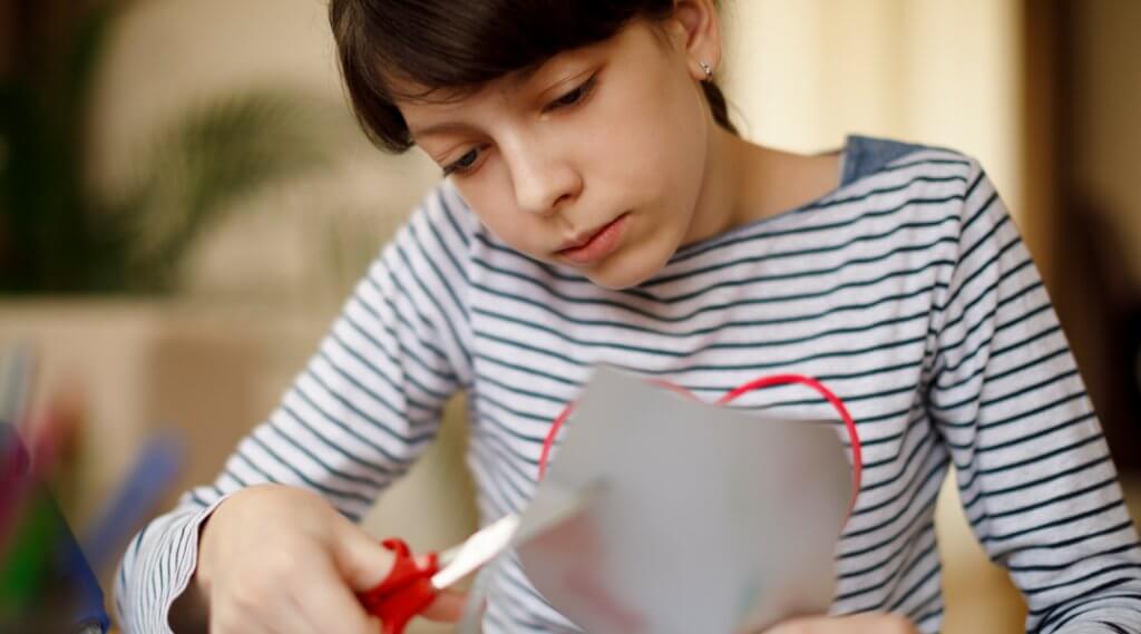 Kid cutting paper