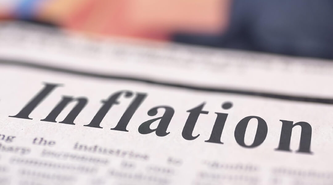 Newspaper with a headline that reads "Infaltion"