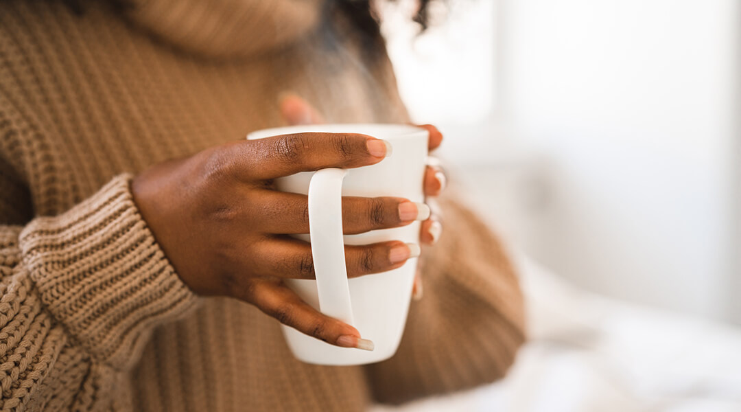 Woman holding a mug