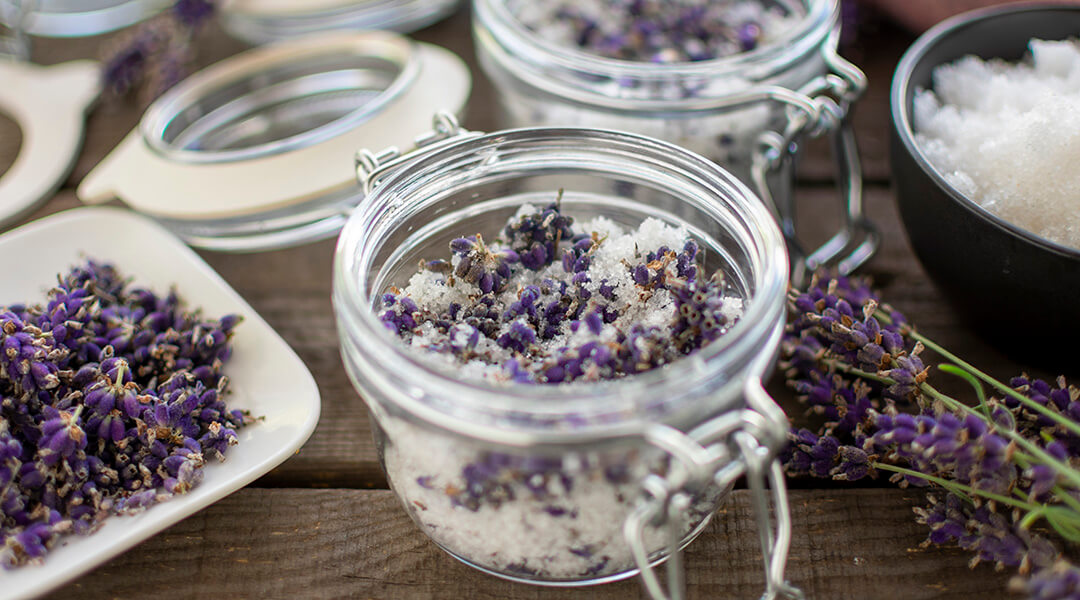 Aromatic lavender bath salt in decorative mason jar in close-up