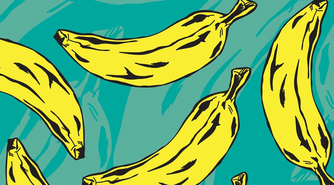 Yellow bananas on a green background in pop art style