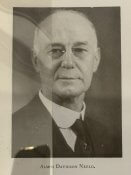 Photo of Almos D. Neeld, Head engineer of the Liberty Tunnels. Man with glasses in a suit.